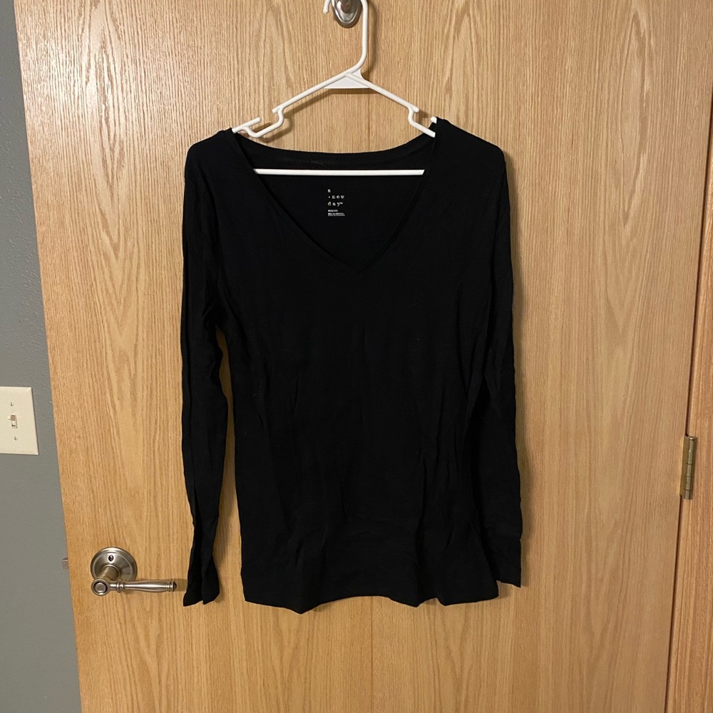 Black v neck long sleeve t shirt.